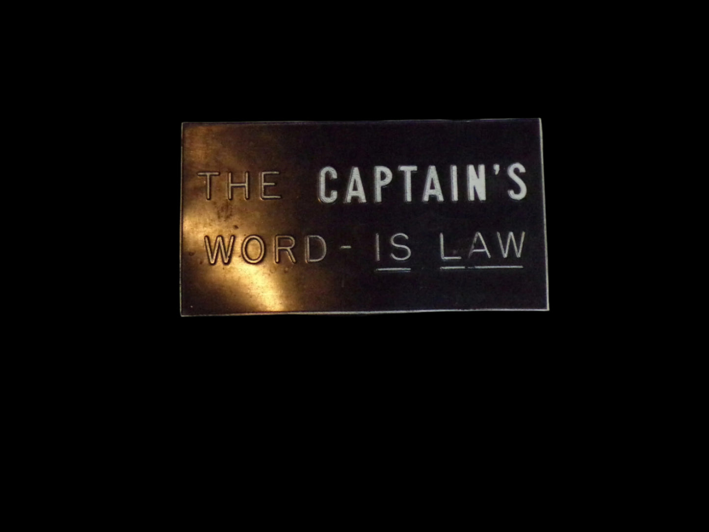 Capain's Word is Law sign
