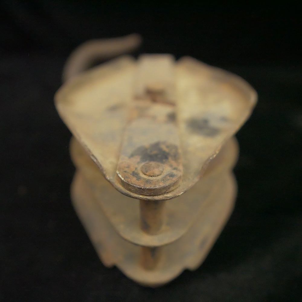 Antique 16-inch double sheave wooden block pulley.