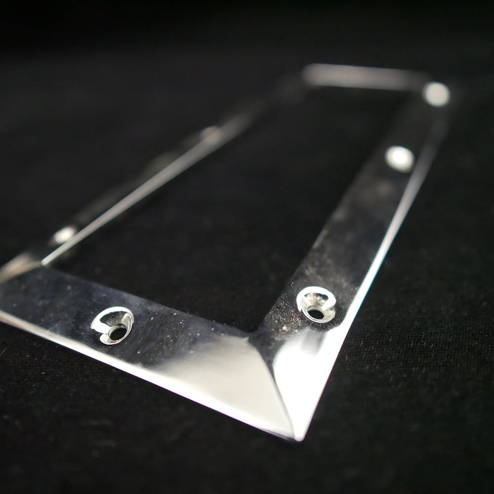 Chrome-plated bronze step plate bracket frame.