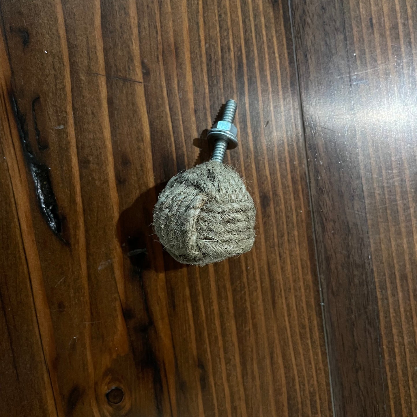 Knob- cast metal and rope