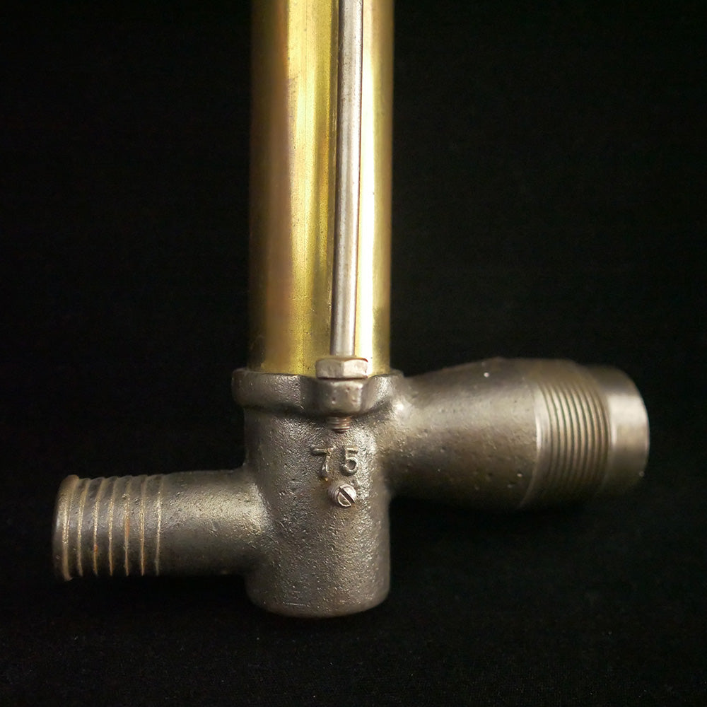 Solid brass antique bilge pump with wooden handle.