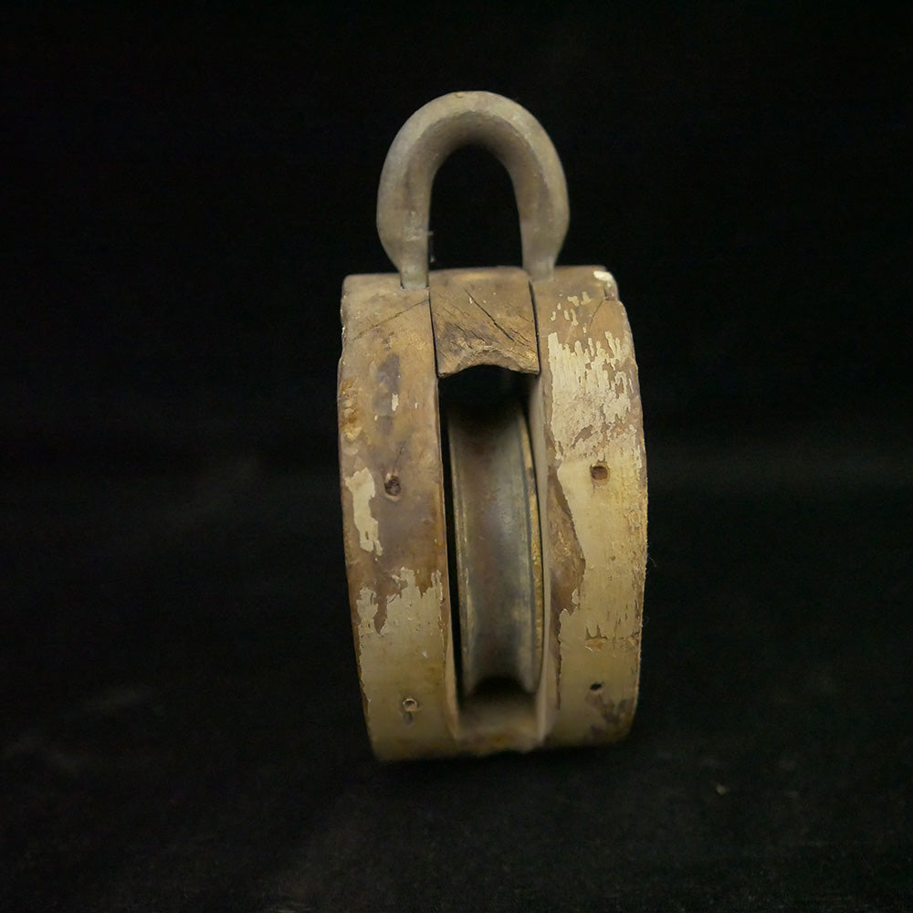 Antique 6-inch single sheave wooden block pulley.