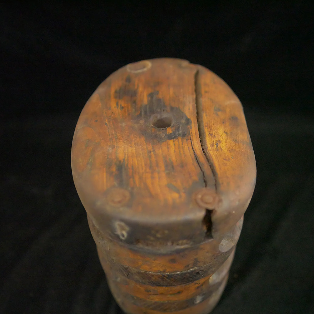Antique 14.5-inch triple sheave wooden block pulley.