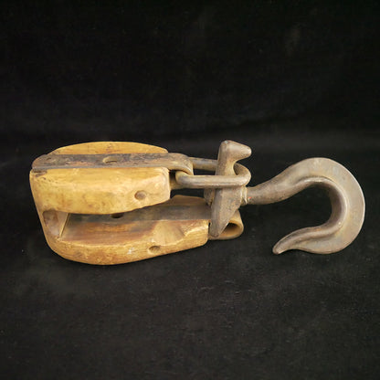 Antique 12-inch single sheave wooden block.