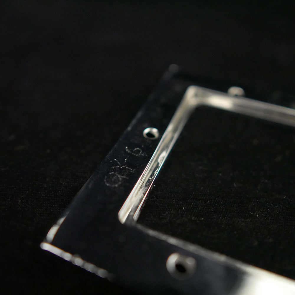 Chrome-plated bronze step plate bracket frame.