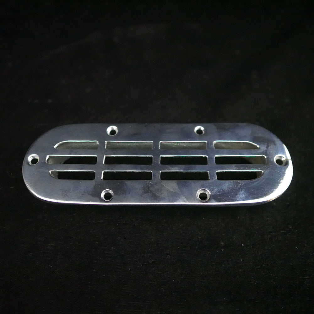Vintage Wilcox Crittenden oval flush stainless steel drain cover.