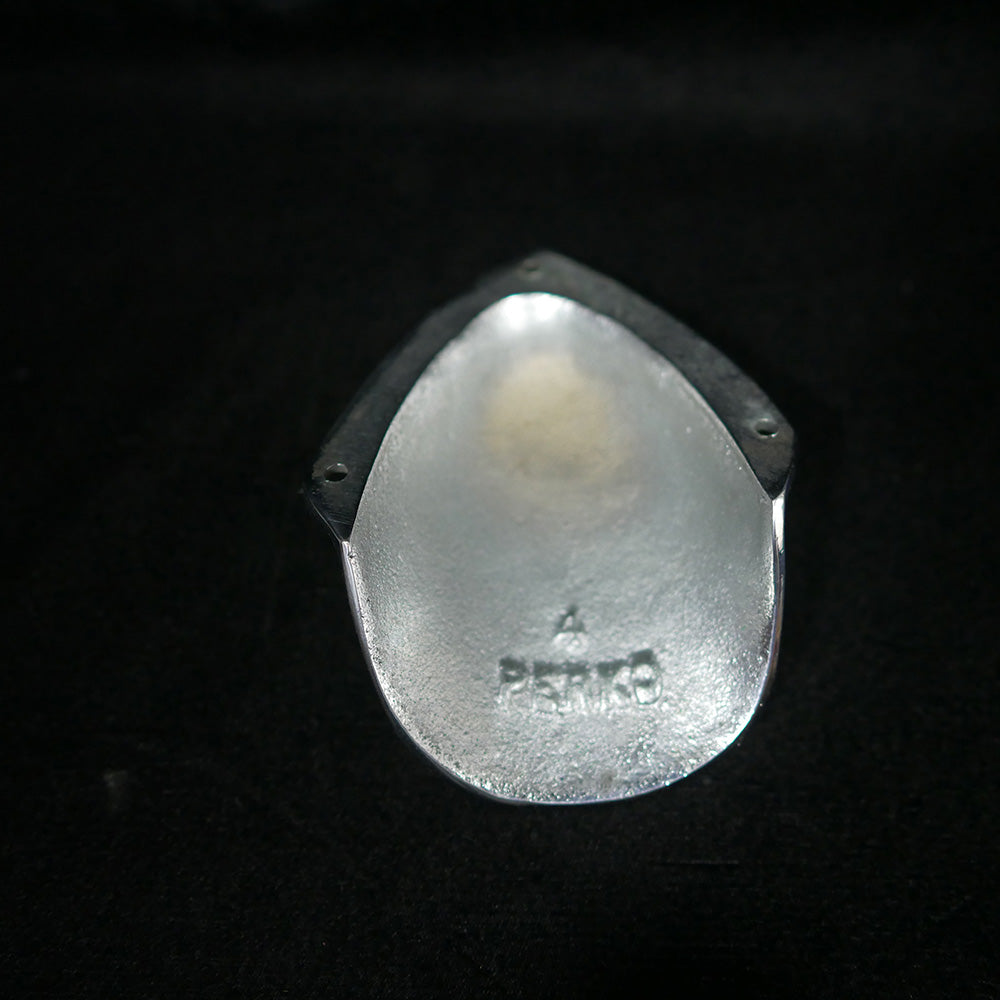 Bottom of 4.5" polished chrome Perko ventilator.