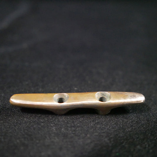 Small brass cleat 3.5"