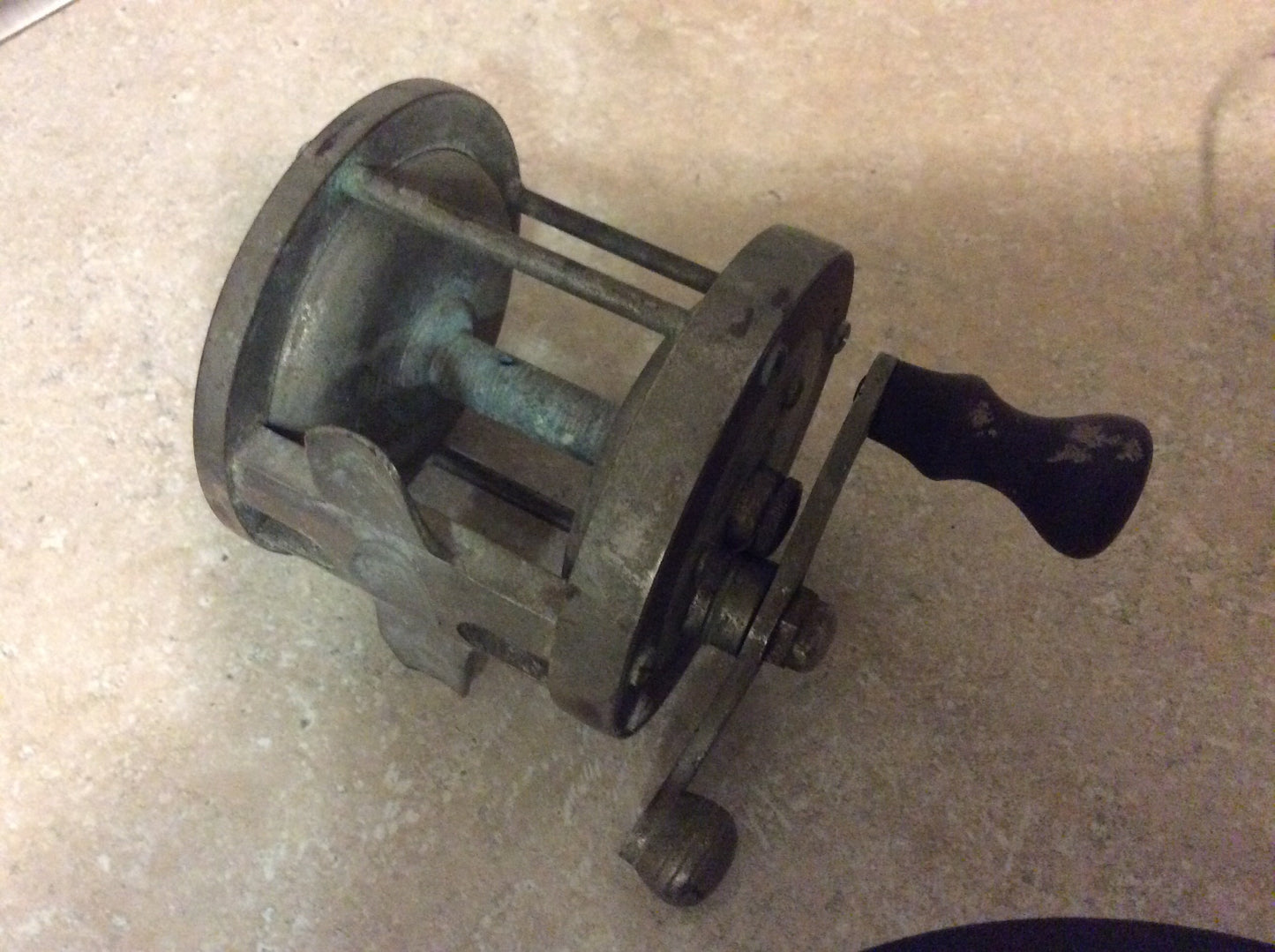 antique fishing reel and poles Reel from fishing pole